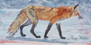 fox walking across a frozen landscape